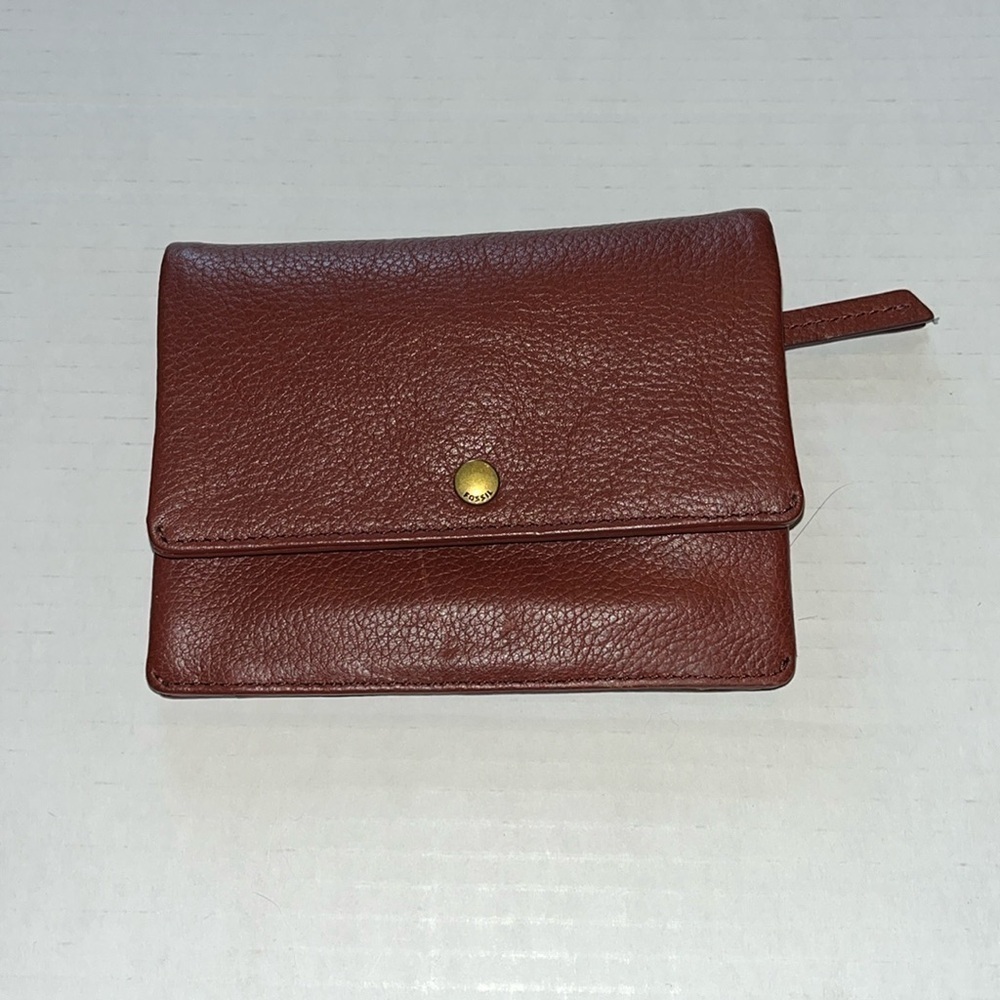 Fossil-brown pebbled leather billfold, wallet, coin pocket cards, bills change.